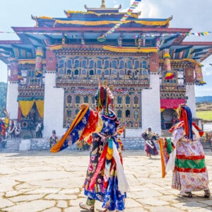 Colorful Bhutan festival with dragon masks