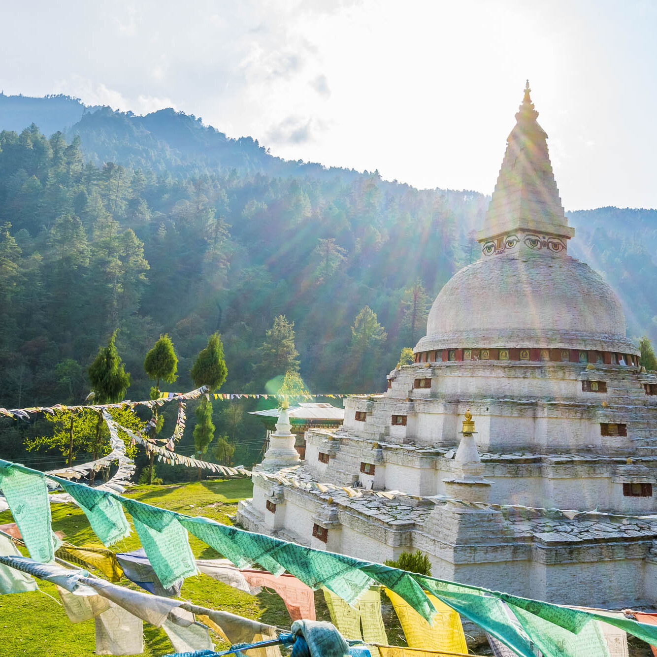 Sun shines over a Buddhist shrine in Bhutan