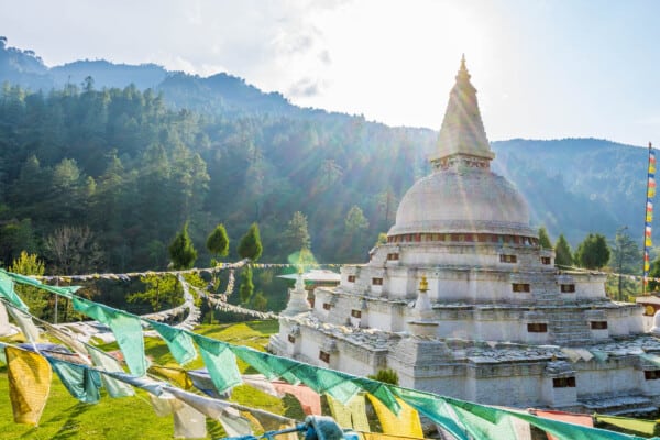 Sun shines over a Buddhist shrine in Bhutan